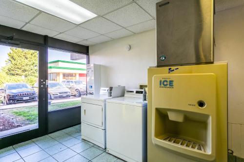 a kitchen with an ice machine in a room at Americas Best Value Inn Edgewood, MD in Edgewood