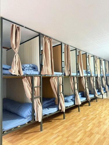 a row of bunk beds in a dorm room at Hostel 405 Sa Pa in Sapa