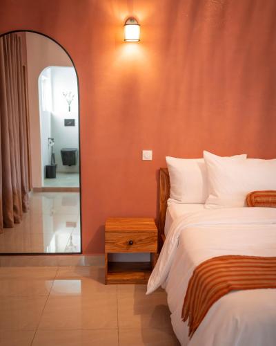 Postel nebo postele na pokoji v ubytování Résidence L'Eau Vive