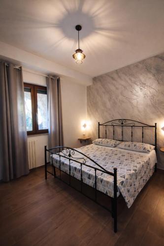 a bedroom with a bed in a room at La Chianconata- Casa vacanze a Vieste in Vieste