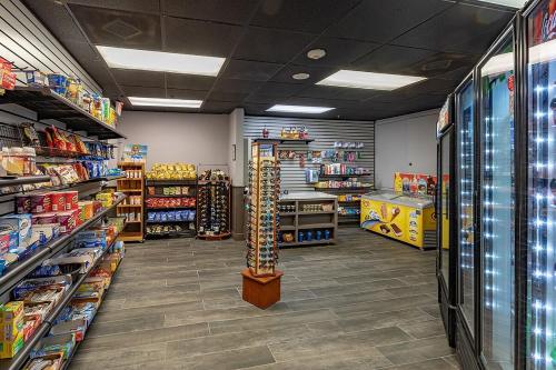 a store aisle with a lot of products on display at 6165 Carrier Drive Unit 1802 Building 1 in Orlando