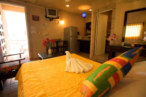 Ένα ή περισσότερα κρεβάτια σε δωμάτιο στο Hotel Sol Caribe