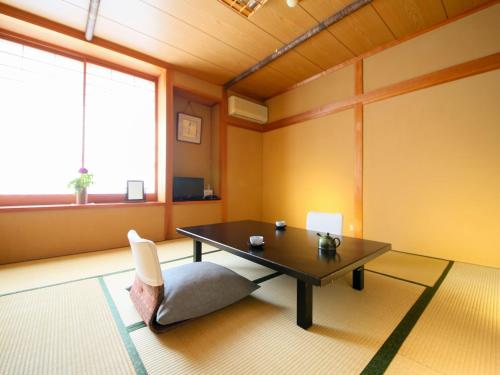 民芸旅館　深志荘にあるベッド