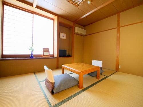 民芸旅館　深志荘にあるテレビまたはエンターテインメントセンター
