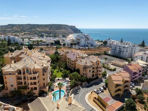 an aerial view of a city with buildings and the ocean at Estrela Apartment by Moje Holiday in Luz