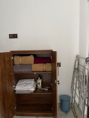 a wooden bunk bed with towels on top of it at Hide Hiriketiya Villa in Dickwella