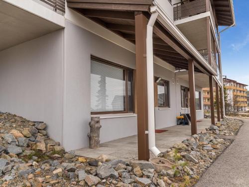 a building with a window on the side of it at Holiday Home Villa ylläs 101 by Interhome in Ylläs