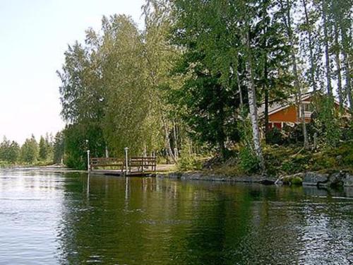 a house on the shore of a body of water at Holiday Home Pernoo 1 by Interhome in Pernoo