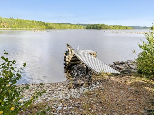 a dock on the shore of a lake at Holiday Home Mäntylä by Interhome in Nurmes