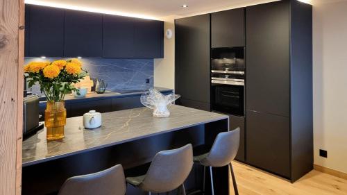 NAGANO 207 | LES GETS | Emplacement exceptionnel en face des pistes au cœur du village | Appartement neuf 4 chambres - 10 personnes by Regent Alps