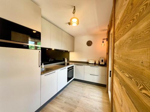 NEW | NAGANO 206 | LES GETS | Situation exceptionnelle en face des pistes | Appt neuf 4 chambres - 9 personnes