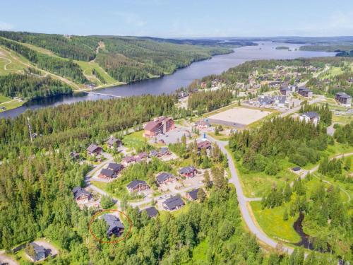 an aerial view of a resort with a lake at Holiday Home Asterix by Interhome in Tahkovuori