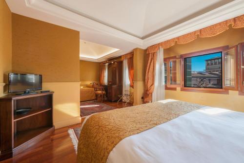 Cama ou camas em um quarto em Hotel Al Codega