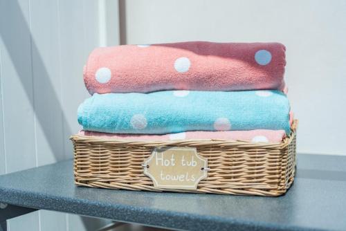 a basket filled with towels on a table at 3 Bed in Braunton oc-b29581 in Braunton