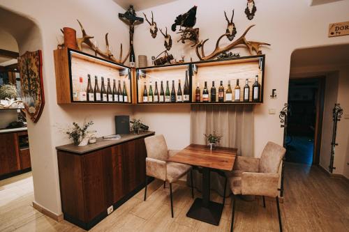 a wine tasting room with a table and chairs at Bauer & Wirt Langthaler in Emmersdorf an der Donau