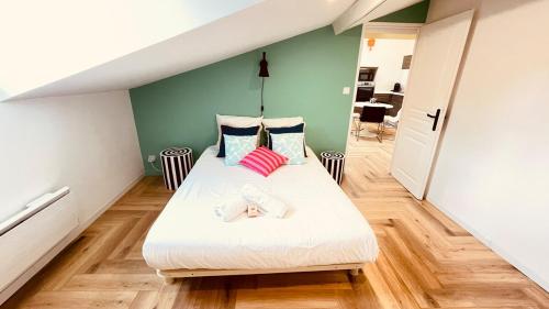 Llit o llits en una habitació de La volière