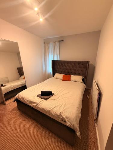 a bedroom with a large bed in a room at Perfect House for Group Getaways - Sleeps 14 - 4BR in Newcastle upon Tyne
