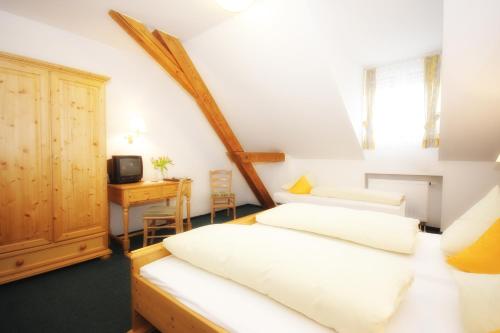 Posteľ alebo postele v izbe v ubytovaní Hotel Trasen