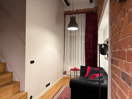 Prostor za sedenje u objektu Loft Black and Red