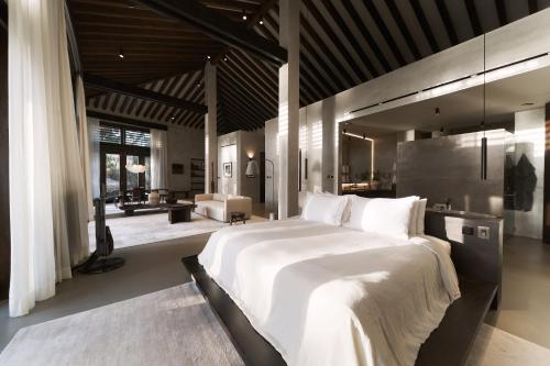 Llit o llits en una habitació de Villa Abrazos