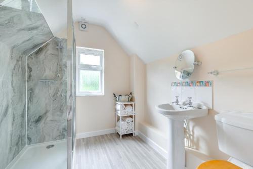 a bathroom with a shower and a sink at 2 Bed in Yatton oc-s32603 in Leinthall Earls