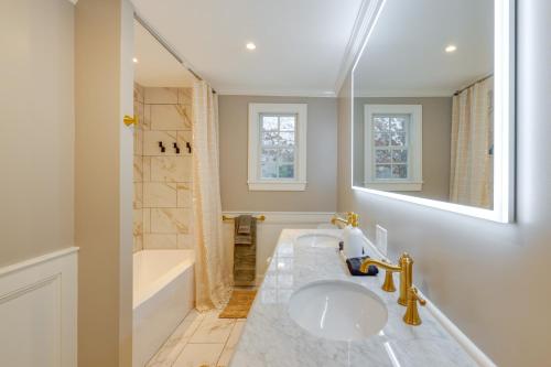 a bathroom with a sink and a shower and a tub at Summer Beach Pass: Wooded Martha's Vineyard Escape in Vineyard Haven