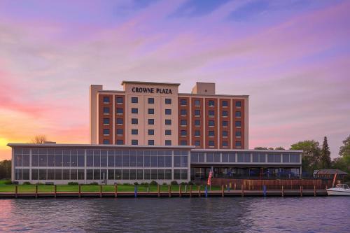 a building with a cruise train sign on top of it at Crowne Plaza Niagara Falls NY - Riverside by IHG in Niagara Falls