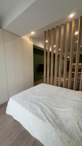 Кровать или кровати в номере Green Haven Studio