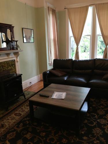 a living room with a couch and a coffee table at Midtown Vibe in Sacramento