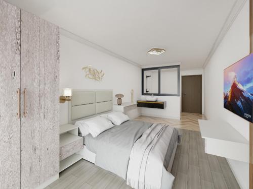 Llit o llits en una habitació de The Ambience