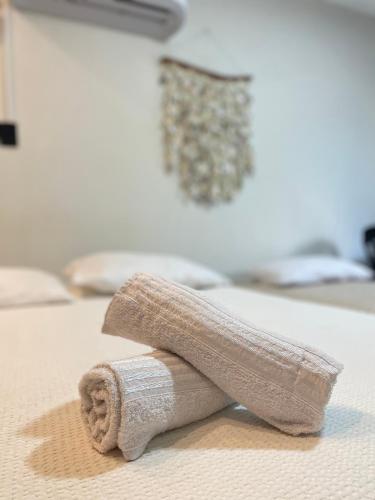 a pair of socks sitting on top of a table at Flat Praia do Pontal in Baía Formosa