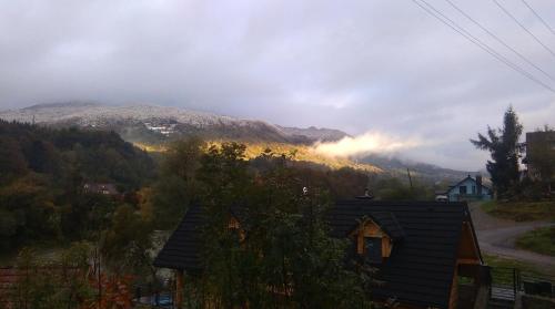 a view of a valley with a mountain in the background at Agroturystyka Tylmanowa in Tylmanowa