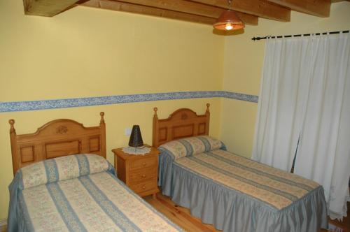 Ліжко або ліжка в номері El Tormal