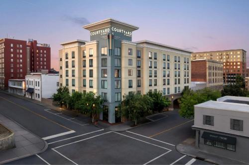 a rendering of a building in a city at Courtyard by Marriott Wilmington Downtown/Historic District in Wilmington