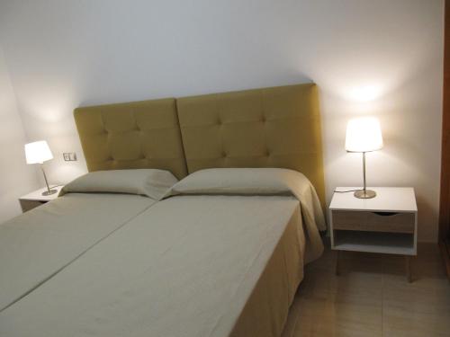 Cama o camas de una habitación en Apartamento " El Pueblo"