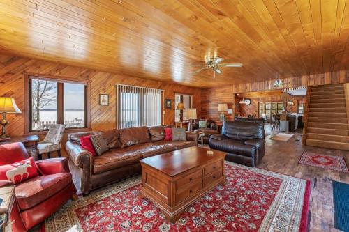 a living room with a couch and a table at Grace Place in Watersmeet