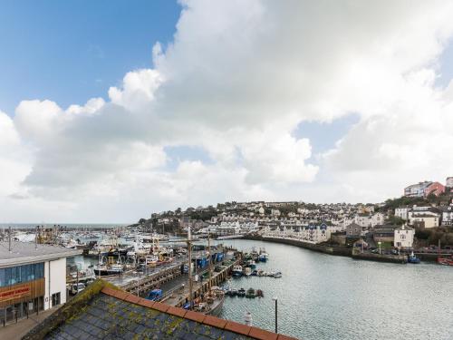 a view of a harbor with boats in the water at Pilgrims Cottage in Brixham