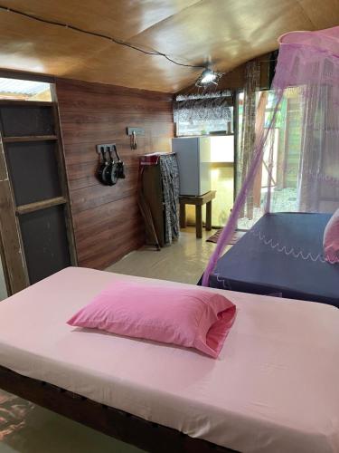 เตียงในห้องที่ FARE Tatahi