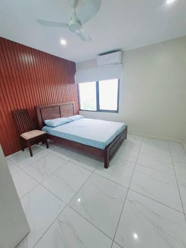 Llit o llits en una habitació de Pacific View Apartments