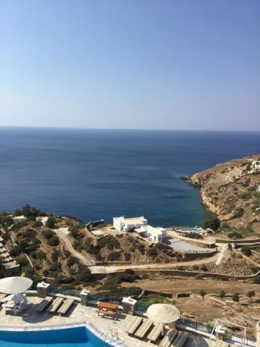 an aerial view of a resort and the ocean at Hermes-Ios Rooms To Let in Ios Chora