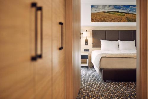 Katil atau katil-katil dalam bilik di Bristol Aparthotel