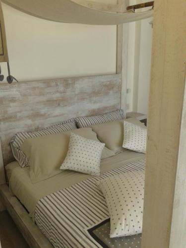 Ένα ή περισσότερα κρεβάτια σε δωμάτιο στο Hotel Madalù