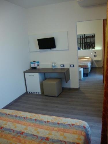 TV a/nebo společenská místnost v ubytování Hotel Venezia