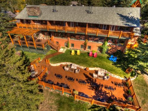 an aerial view of a large house with a deck at Overlander Mountain Lodge in Jasper