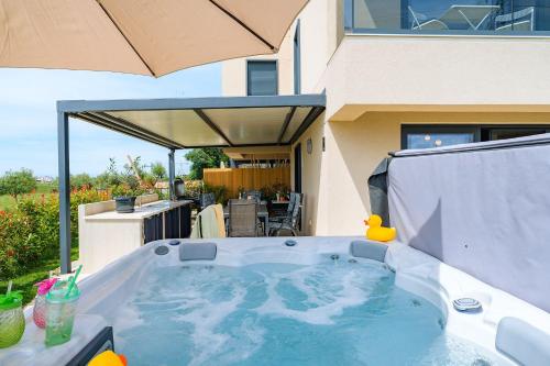 Atemberaubendes Apartment mit Whirlpool, Grillbereich, Smart TV