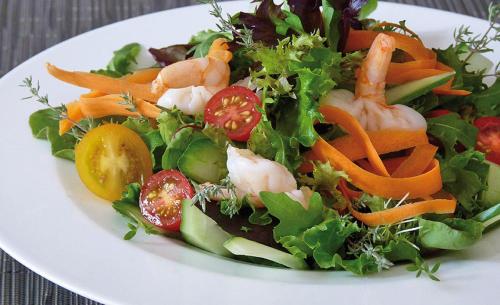 a salad on a white plate on a table at Hotel Alte Vogtei in Wolframs-Eschenbach