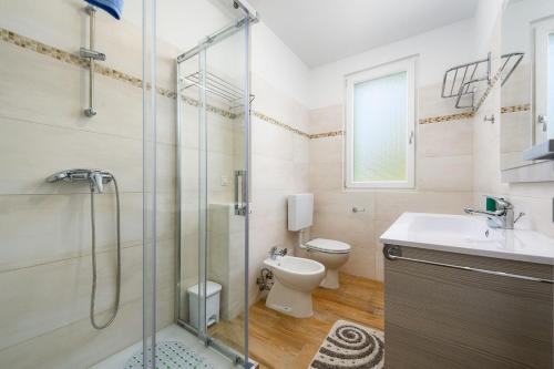 Malerisches Apartment nur 280 Meter zum Strand mit Grill, Klima, WiFi