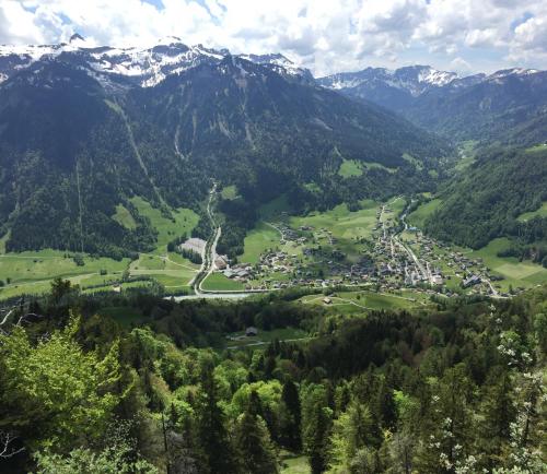 an aerial view of a village in the mountains at Gästehaus Manuela Puchmayr in Mellau