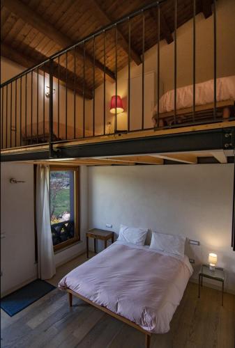 a bedroom with a bunk bed in a room at Agriturismo Cignale della Società Agricola Cignale srl in Penne