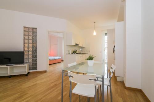 Area soggiorno di The Best Rent - Fiera Milano City Apartment